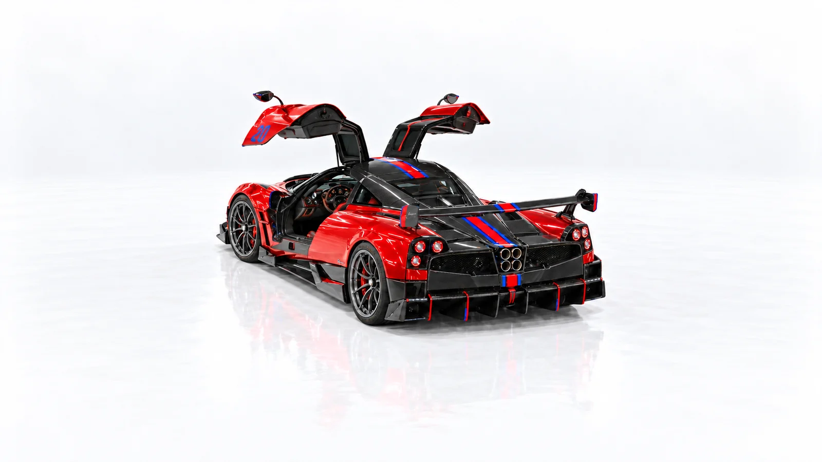 Rear-left view of the red Huayra BC with both gullwing doors raised